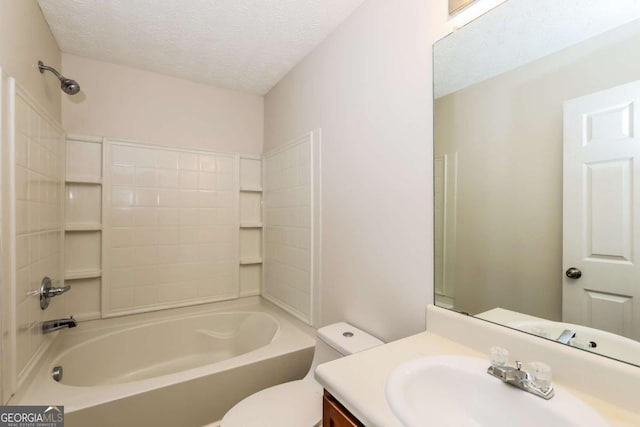 full bathroom with toilet, vanity, a textured ceiling, and washtub / shower combination