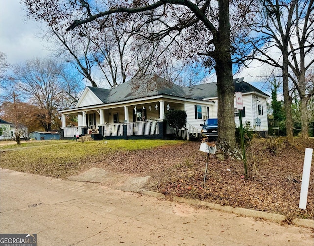 view of front of home featuring covered porch