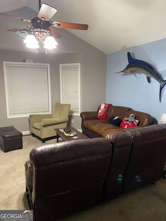 living room with vaulted ceiling, carpet flooring, and ceiling fan