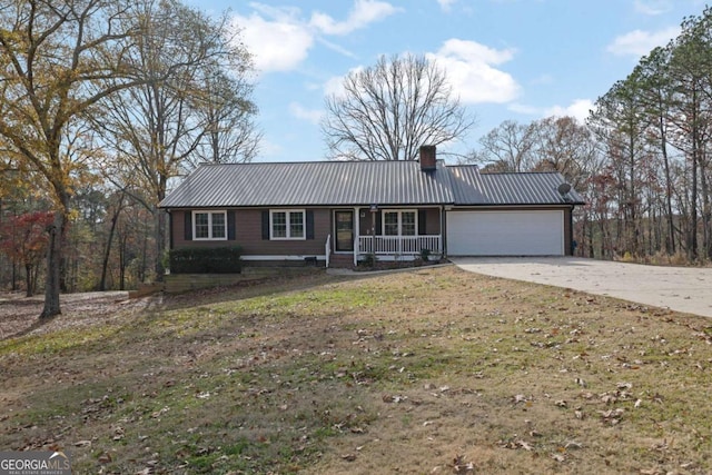 ranch-style house featuring a porch and a garage