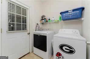 laundry area featuring separate washer and dryer