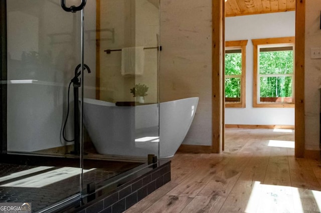 bathroom with wood ceiling and wood-type flooring