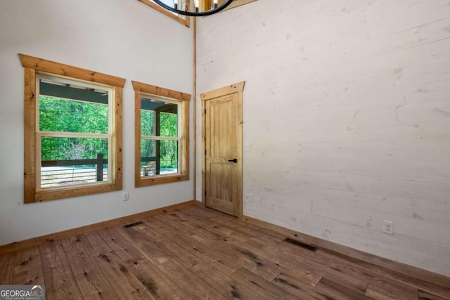 empty room with wood-type flooring