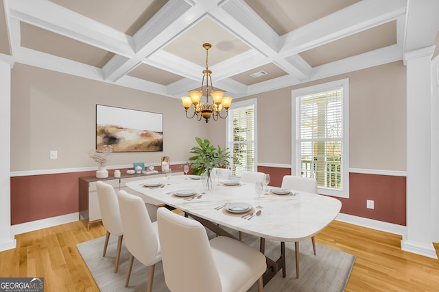 dining space with beam ceiling, light hardwood / wood-style floors, and coffered ceiling