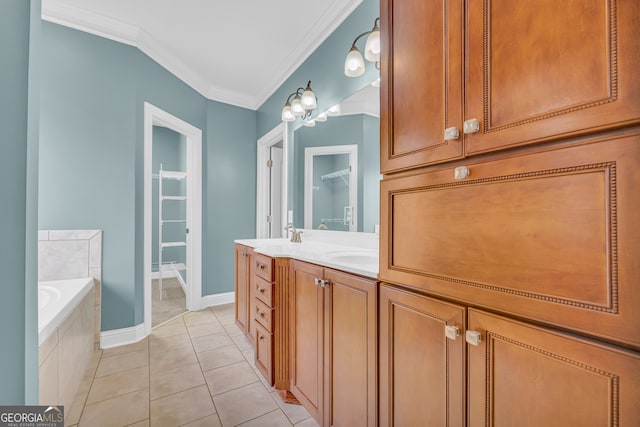 bathroom with tile patterned floors, vanity, ornamental molding, and tiled tub