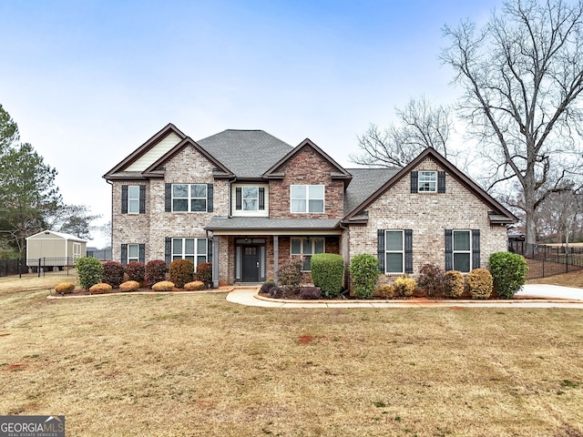 craftsman-style home with a front lawn