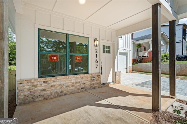 property entrance featuring a garage