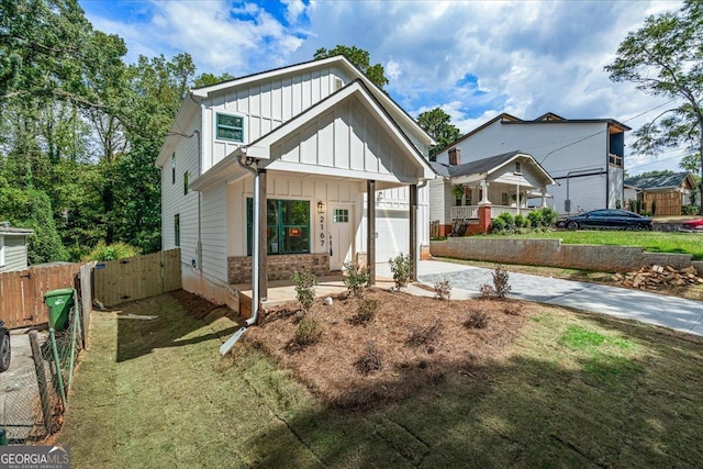 modern farmhouse with a front yard