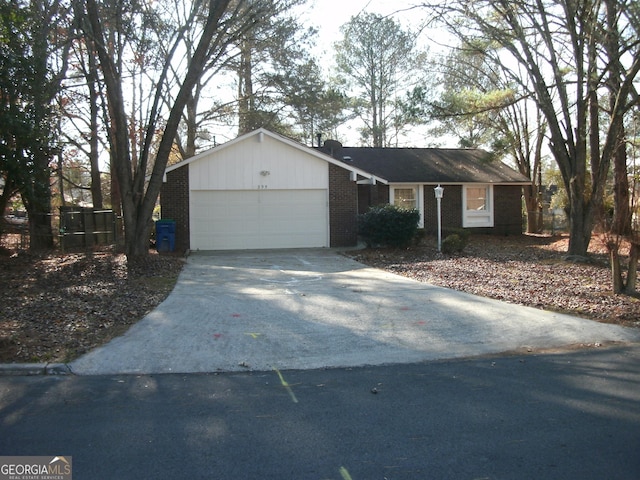 single story home with a garage