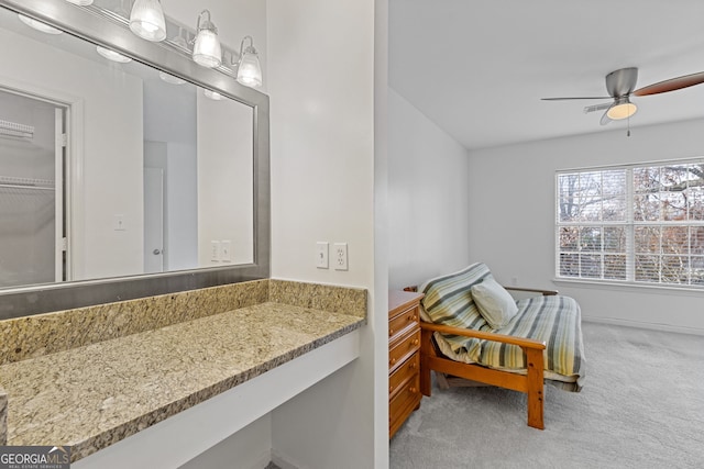 bathroom featuring ceiling fan and vanity