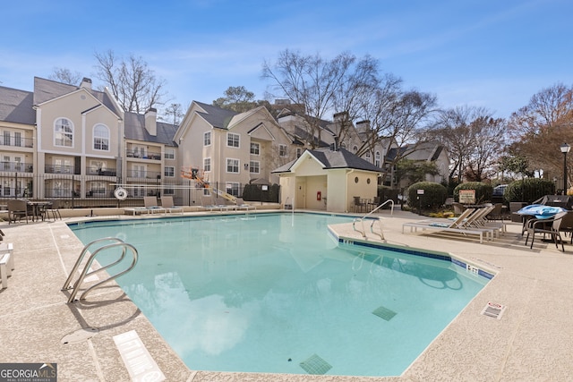 view of pool featuring a patio