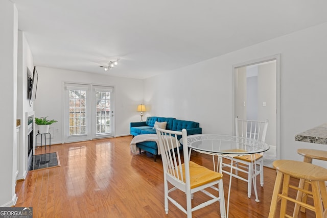 dining space featuring light hardwood / wood-style floors