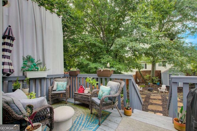 wooden balcony featuring a wooden deck