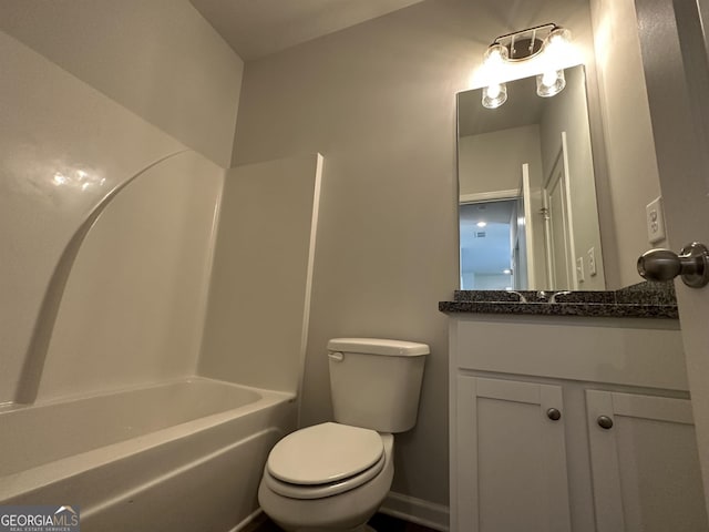 full bathroom with vanity, bathtub / shower combination, and toilet