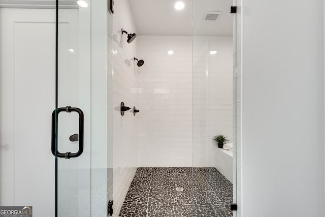 bathroom with an enclosed shower