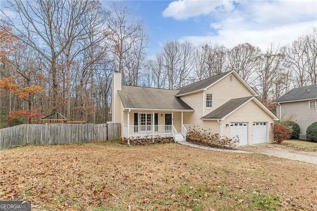 view of front of home featuring a garage and covered porch