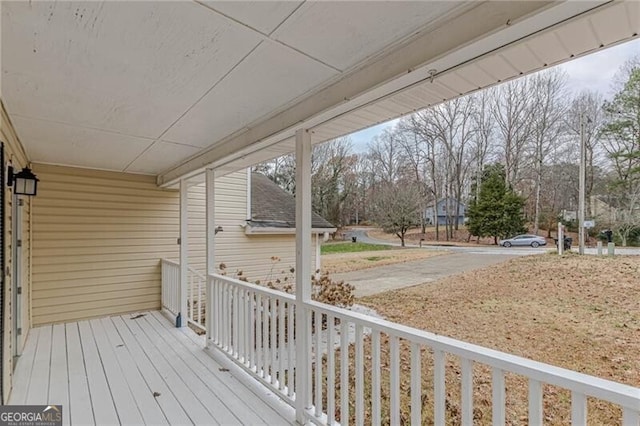 wooden deck featuring covered porch