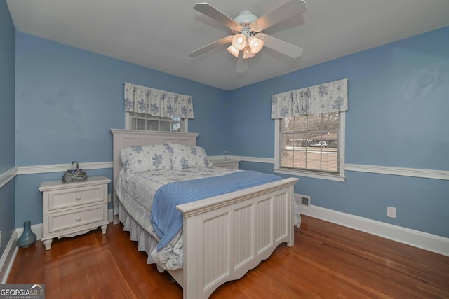 bedroom with hardwood / wood-style flooring and ceiling fan