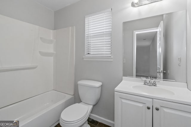 full bathroom featuring tile patterned floors, vanity, tub / shower combination, and toilet