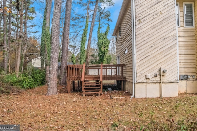 exterior space with a wooden deck