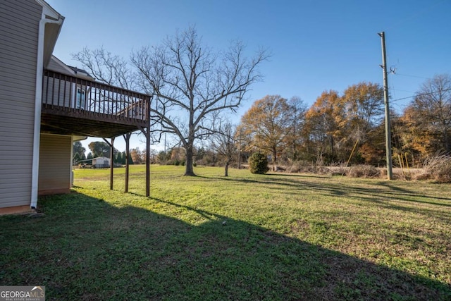 view of yard featuring a deck