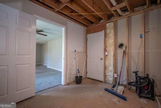 basement featuring ceiling fan