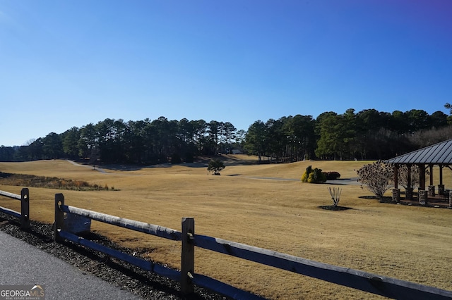 view of yard featuring a gazebo and a rural view