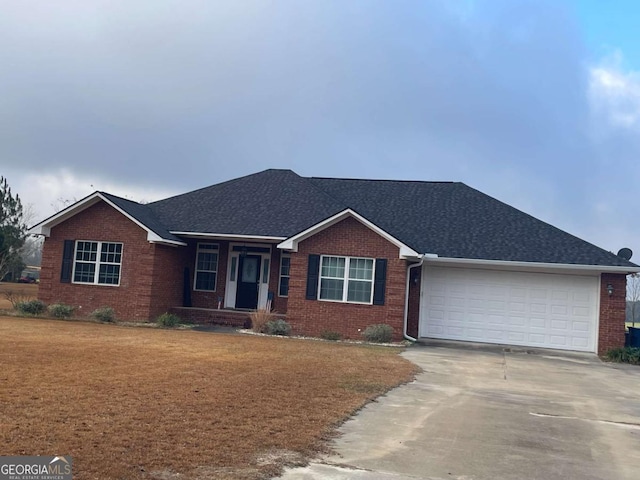 single story home with a garage