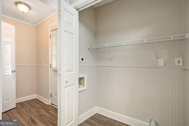 laundry area with hookup for an electric dryer, crown molding, dark wood-type flooring, and hookup for a washing machine