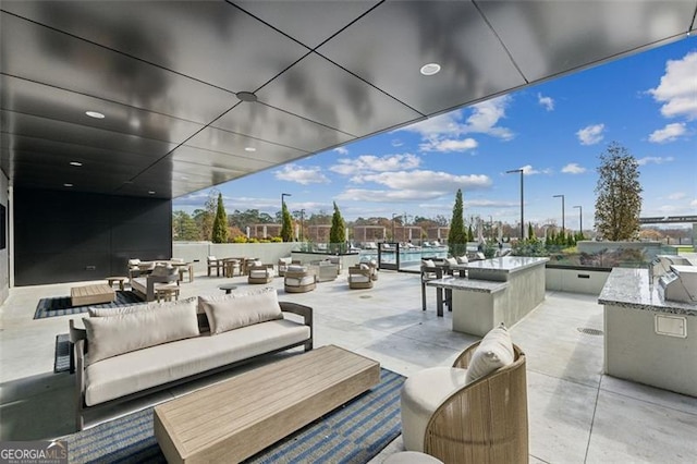 view of patio featuring an outdoor living space and area for grilling