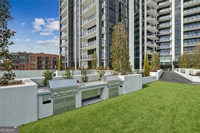 view of patio with a grill and area for grilling