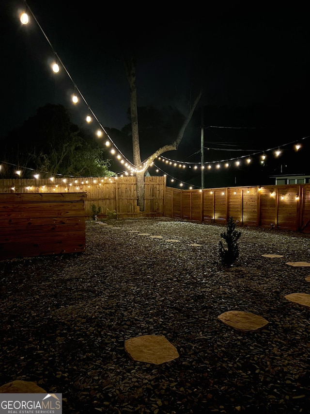 view of yard at night