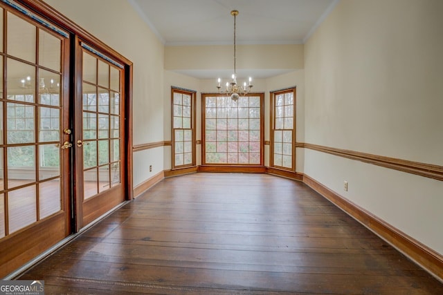 living room featuring french doors, a brick fireplace, ornamental molding, and hardwood / wood-style floors