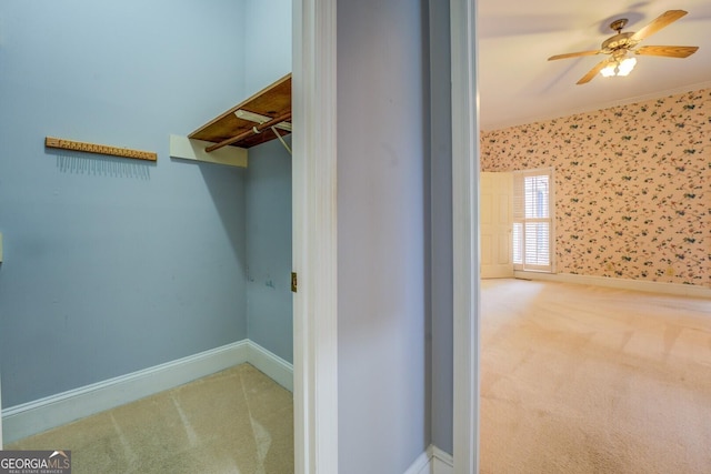 additional living space featuring ceiling fan, light carpet, a wall unit AC, and vaulted ceiling