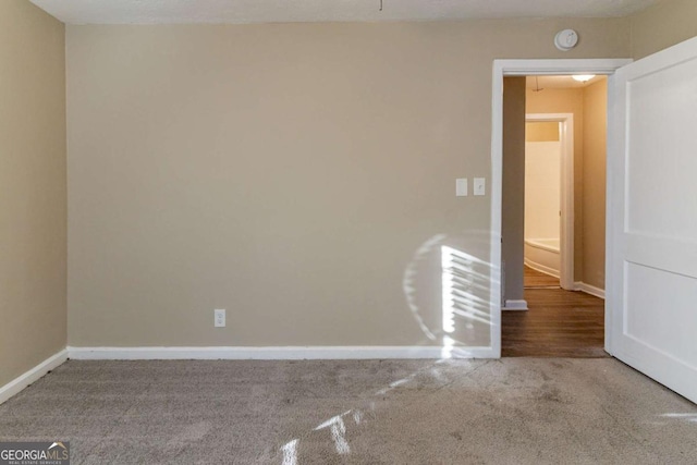 view of carpeted spare room