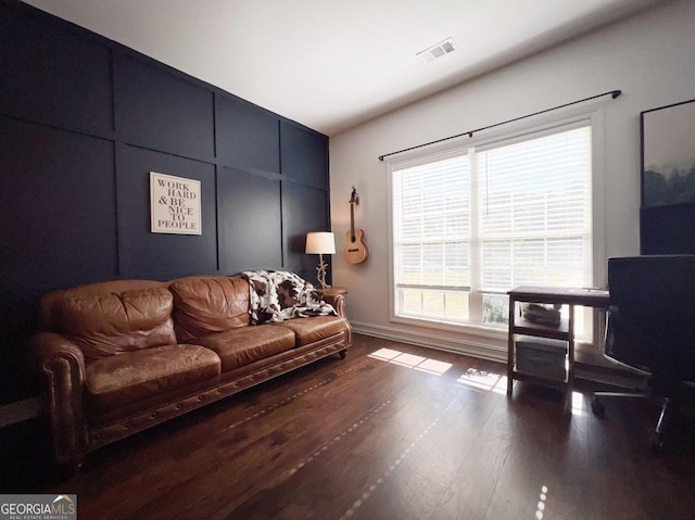 living room featuring dark hardwood / wood-style floors