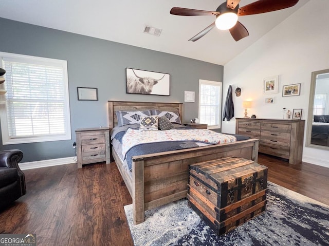 bedroom with dark hardwood / wood-style floors, ceiling fan, and lofted ceiling