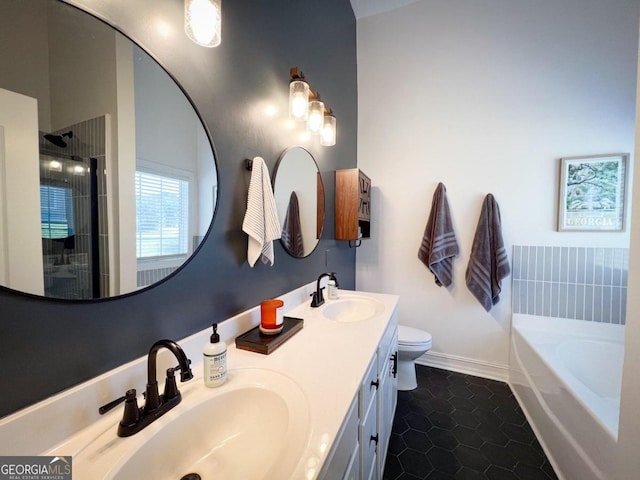 full bathroom featuring tile patterned flooring, vanity, shower with separate bathtub, and toilet