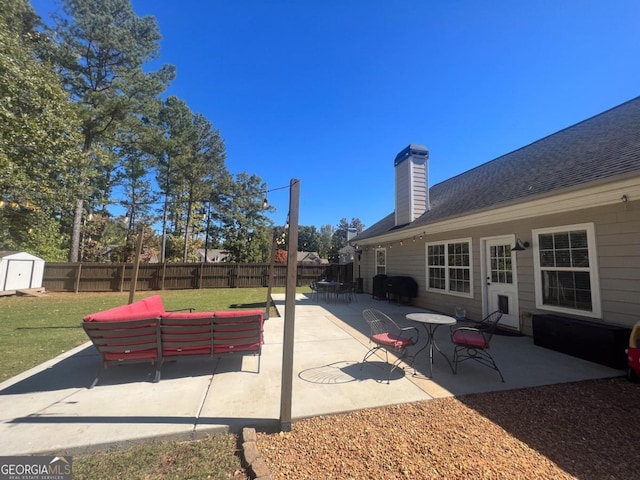 view of patio / terrace featuring an outdoor living space and a grill