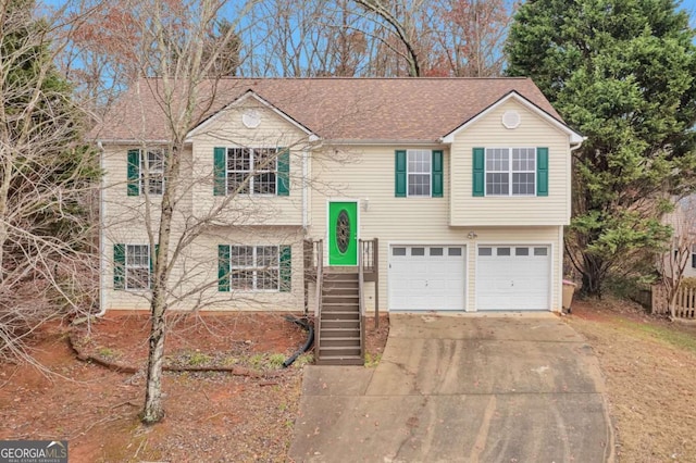 split foyer home featuring a garage