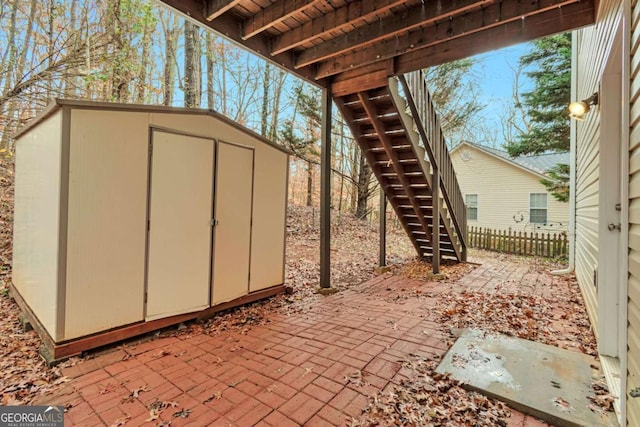 view of patio / terrace featuring a storage shed