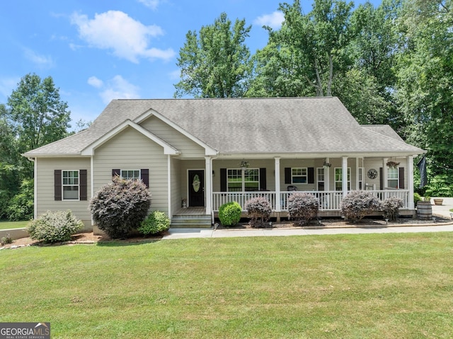 view of front of home with a front lawn and covered porch