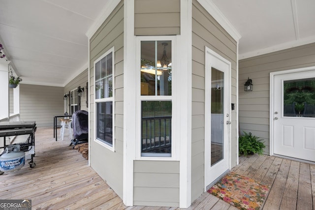 wooden deck featuring covered porch