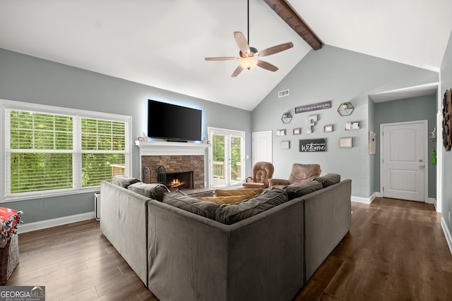 living room featuring high vaulted ceiling, ceiling fan, a fireplace, beam ceiling, and dark hardwood / wood-style flooring