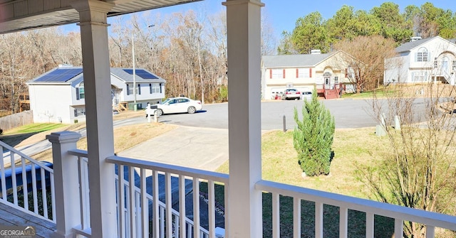 view of yard with covered porch