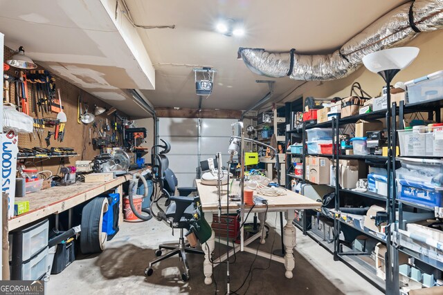 garage featuring a workshop area