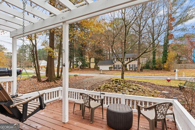 wooden deck with a pergola