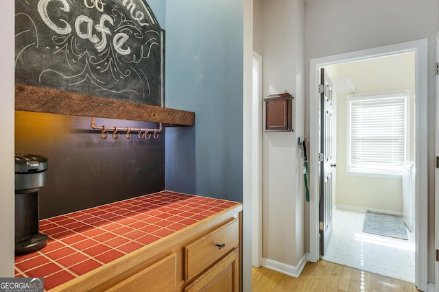 bathroom featuring hardwood / wood-style flooring