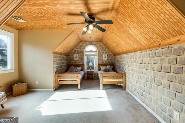 unfurnished bedroom featuring multiple windows, carpet, and wooden ceiling