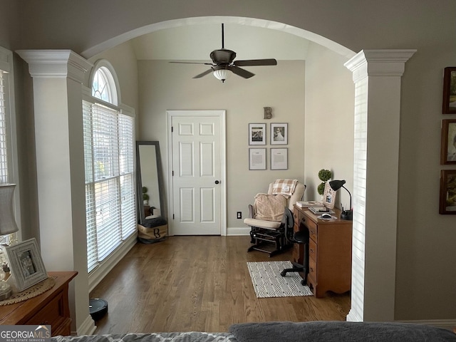 office featuring wood-type flooring and ceiling fan